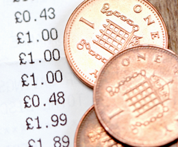 An image of british coins and receipt
