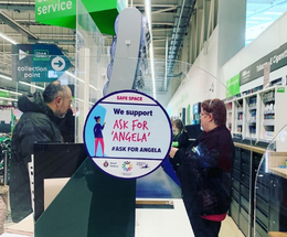 An image of Ask for Angela sticker is displayed at a supermarket