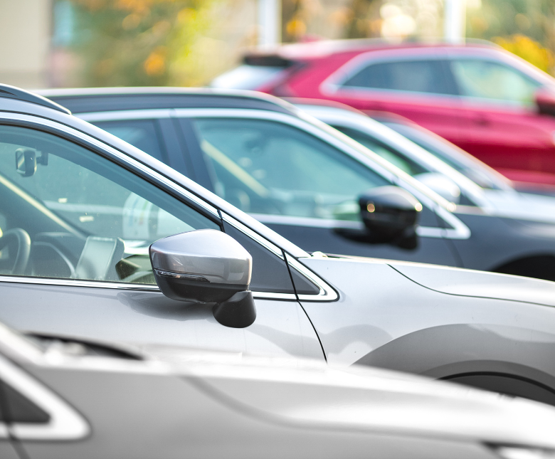 An image of a row of parked cars