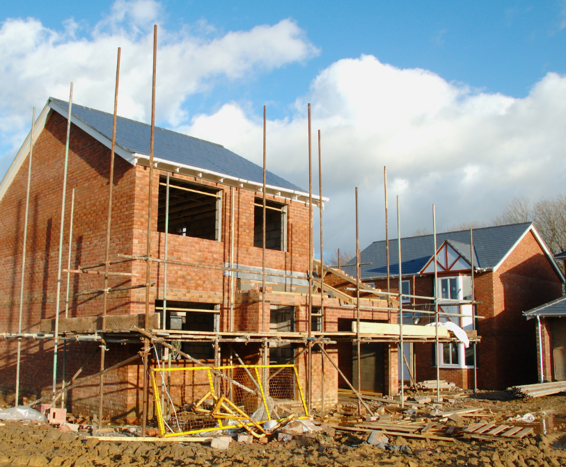 A library photo of houses being built
