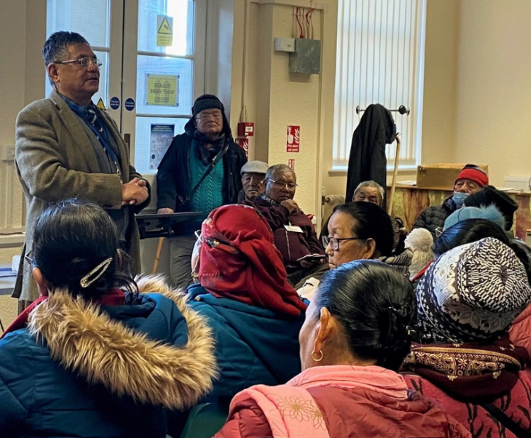 Chief Co-ordinator Shivadhan Rai addresses an audience at the Nepalese Community Centre