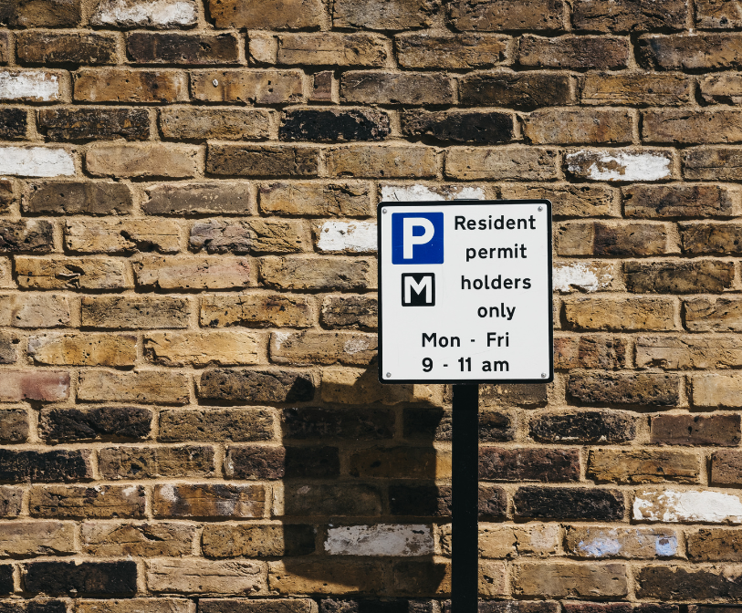 A stock image of a CPZ signage which outlines parking restrictions within a designated area.