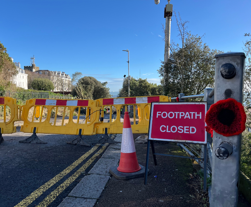 A photograph at the top of the Road of Remembrance in Folkestone, which shows both the road and footpath are both closed.