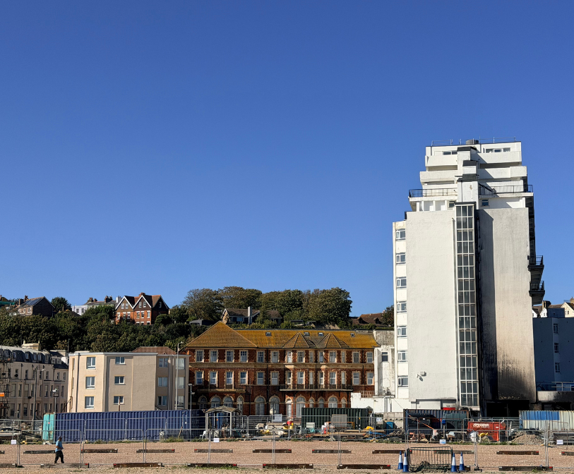 A photograph taken from the side of Pavilion Court and the fire-impacted Grand Burstin Hotel.