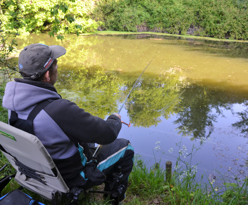 A member of the Cinque Ports Angling Society fishing the Royal Military Canal at West Hythe.