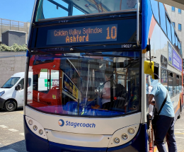 Passengers getting on a number 10 bus parked in Folkestone bus station.